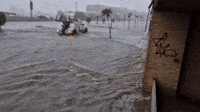 Motorists Navigate Floodwaters in Spain's Murcia Region