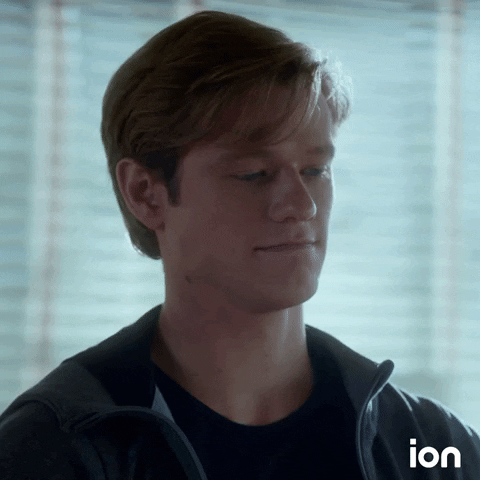 TV gif. Lucas Till as Mac in MacGyver takes a slight inhale of breath and shrugs gently before tilting his lips and looking up.