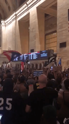 Protesters in New York's Grand Central Terminal Call for Puerto Rico Governor's Resignation