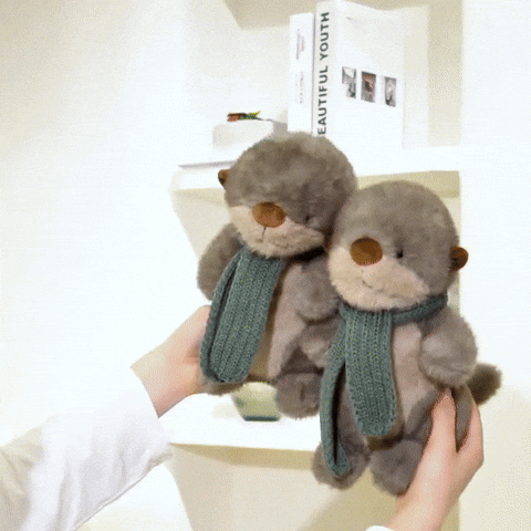 peluche-loutre-echarpe-gif