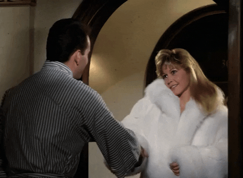 furglamor giphyupload 1980s handshake fur coat GIF