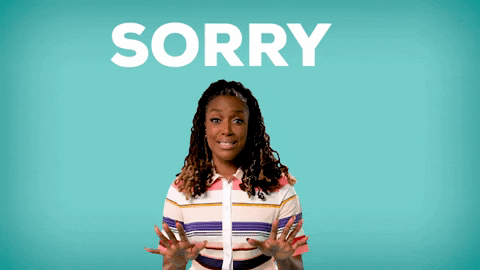 Video gif. Woman looks at us with a worried look on her face and holds her hands out, but then quickly changes her tune and starts swaying back and forth and smiling in a mocking way. Text, “sorry not sorry.”