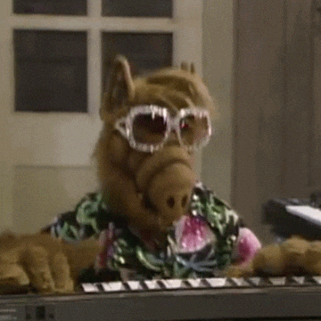 Elton John 80S GIF by absurdnoise