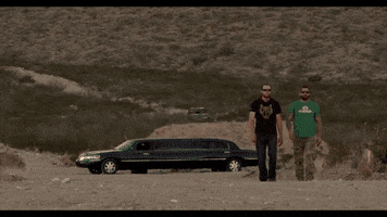 FullMag boom explosion slow motion walk away GIF