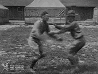 NationalWWIMuseum black and white wrestling fighting military GIF