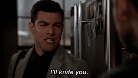 TV gif. Max Greenfield as Winston Schmidt in New Girl threatens, "I'll knife you."