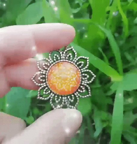 Intuita giphygifmaker jewelry sunflower necklaces GIF