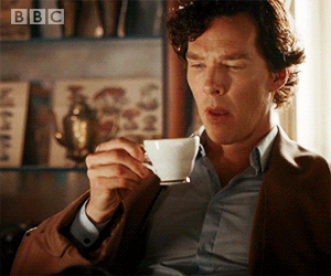 TV gif. Benedict Cumberbatch as Sherlock Holmes considers over a cup of tea.