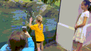 girl tiger plays GIF