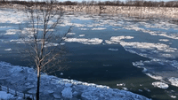 Ice Floes Drift Along New York's Niagara River Towards Lake Ontario
