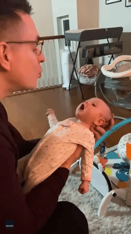 8-Week-Old Baby Tries Her Best to Mimic Dad