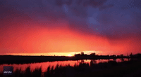 Spectacular Sunset Glows Over Minnesota Wetland