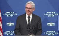 Merrick Garland Shrug GIF by GIPHY News
