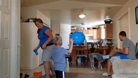 Dog Discovers the Joys of Playing With a Balloon