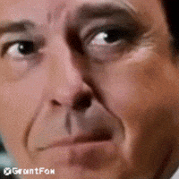 Evil Smile GIF