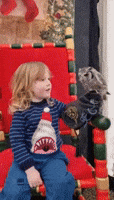 Kid Tries Not to Get Fingers Bitten While Bonding With Owl