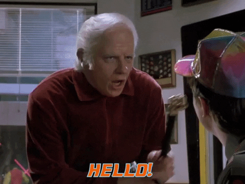 Movie gif. Tom Wilson as Biff in Back to the Future 2 bonks Marty McFly on the head with a cane.