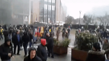 Police Use Water Cannon, Tear Gas Against Anti-Migration Protesters Outside EU Commission HQ