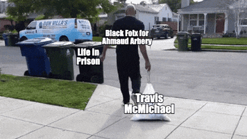 Video gif. Man labeled “Black folx for Ahmaud Arbery” drags a bag of trash labeled “Travis McMichael” out to the street and throws it into a trash can labeled “Life in prison.”