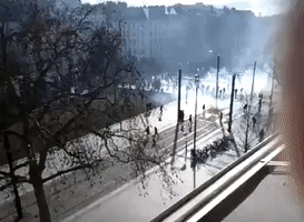 Riot Police Quell Demonstrations With Tear Gas, Water Cannon