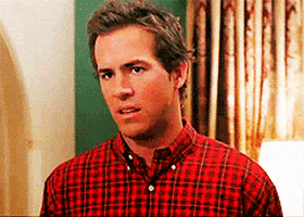 Movie gif. Ryan Reynolds as Chris in Just Friends looks exasperated as he throws his head back and rolls his eyes. 