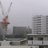 Crane Sways as Typhoon Trami Hits Okinawa