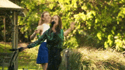 water dancing GIF by Neighbours (Official TV Show account)
