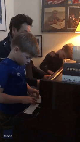 Father and Sons Play Piano Together to Pass Time During Lockdown