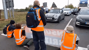 Arrests as Housing Insulation Campaigners Block Motorway Junctions Near London