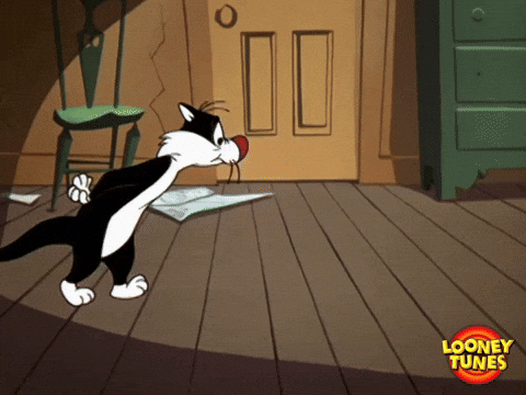 Cartoon gif. Sylvester the Cat from Looney Tunes paces back and forth in a room with his hands tucked behind his back.