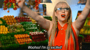 Reality TV gif. A woman on Masterchef raises both of her arms, smiles, and looks up, saying, "Woohoo! I'm so excited!"