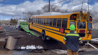 Arizona Crews Remove School Bus Stuck in Sinkhole Near Flagstaff
