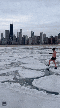 Chicago Man Takes a Stroll on Lake Michigan Ice Pancakes in Swim Trunks