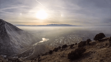 Sunset Appears Over Fast-Flowing Clouds in Hypnotic Video