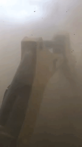 Digger Trucks Work Through Melbourne Dust Storm