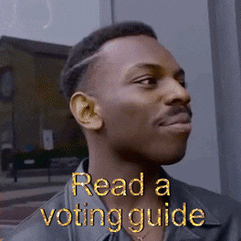 Video gif. Smiling man taps his temple and gives us a knowing smile. Text, “Read a voting guide.”