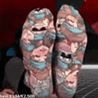 UrbanBravo giphyupload twitch feet socks GIF
