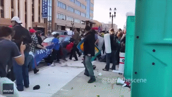 Fight Breaks Out in Lansing Amid Protests and Celebrations Following Biden's Win
