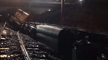 Workers Remove Freight Train After Michigan Derailment