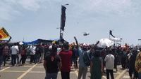 Helicopter Flies Low Over Protesting Crowds in Sri Lanka