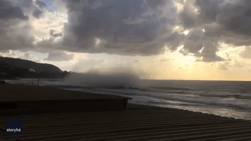 Beachgoers Scatter as Waterspout Reaches Land in Sicily