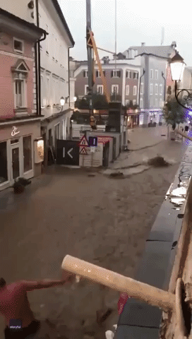 Plants and Furniture Washed Away by Floodwater on Austrian Street