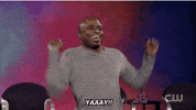 TV gif. Wayne Brady on Whose Line Is It Anyway smiles as his whole body shakes and his arms flail wildly. Text, "Yay!"