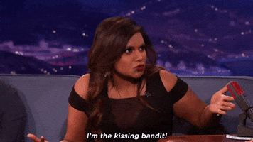 kissing mindy kaling GIF by Team Coco