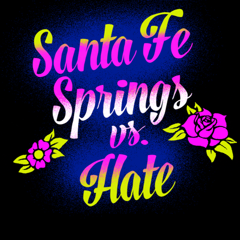 Text gif. Graphic graffiti-style painting of feminine script font and stenciled tattoo flowers, all in neon pink and chartreuse, text reading, "Santa Fe Springs vs hate," then hate is sprayed over with the message, "Call 211, to report hate."