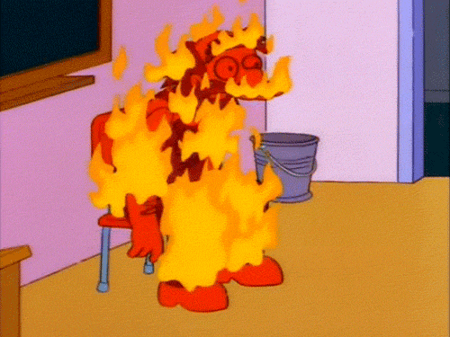 The Simpsons gif. Groundskeeper Willie is lit on fire but can't do anything except sit petrified and let the flames envelop him.