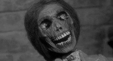Alfred Hitchcock Skull GIF