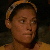 Reality TV gif. Michele Fitzgerald on Survivor raises her eyebrows and chews her bottom lip glancing around as if unimpressed.  