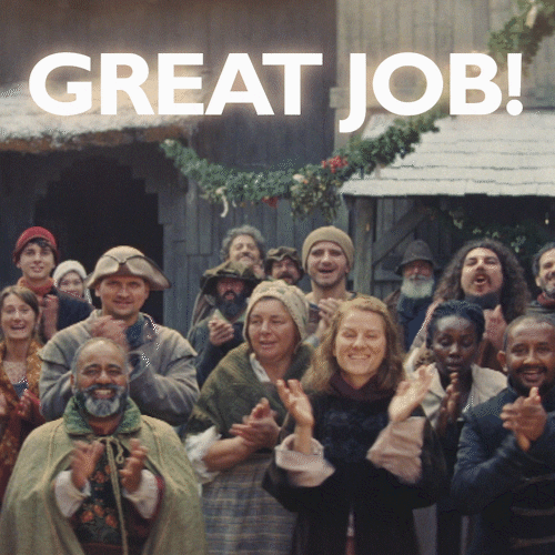 Video gif. Group of people wearing colonial clothing smile and look at us while clapping. Text, "Good Job."