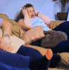 scared covering ears GIF